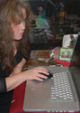 Glenda  using laptop computer